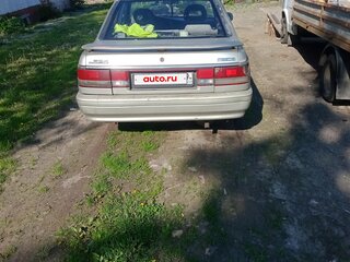 1990 Mazda 626 III (GD), золотистый, 70000 рублей, вид 1