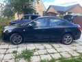 2012 Chevrolet Cruze I Рестайлинг, чёрный, 535000 рублей - вид 3