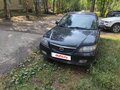 2002 Mazda 323 VI (BJ) Рестайлинг, чёрный, 100000 рублей