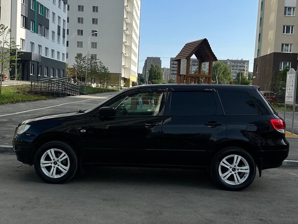2001 Mitsubishi Airtrek I, чёрный - вид 1