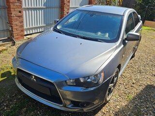 2012 Mitsubishi Lancer X Рестайлинг, серый, 850000 рублей, вид 2