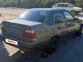 2003 Daewoo Nexia I, коричневый, 145000 рублей, вид 5