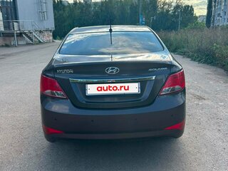 2015 Hyundai Solaris I Рестайлинг, коричневый, 900000 рублей, вид 3