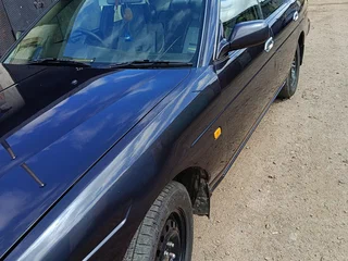 1997 Nissan Laurel VIII (C35), чёрный, 300000 рублей, вид 1