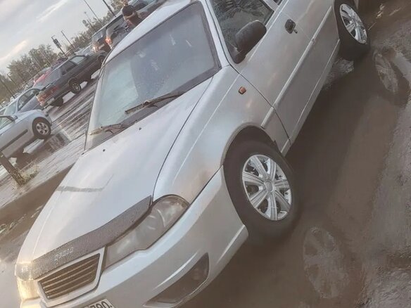 2009 Daewoo Nexia I Рестайлинг, серебристый - вид 4