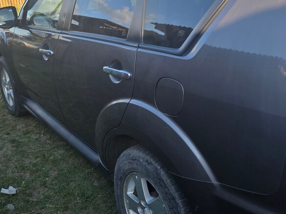 2012 Mitsubishi Outlander II Рестайлинг, коричневый - вид 1
