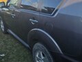 2012 Mitsubishi Outlander II Рестайлинг, коричневый - вид 1