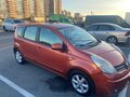 2008 Nissan Note I, оранжевый - вид 1