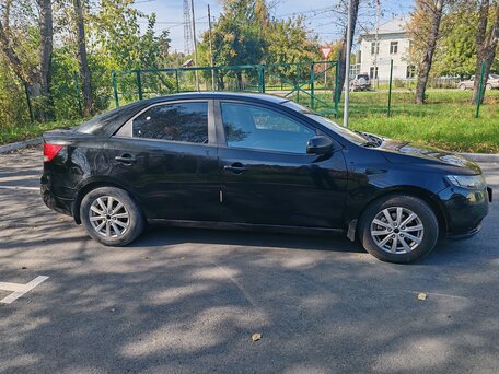 2010 Kia Cerato 6-speed II, чёрный, 650000 рублей, вид 2