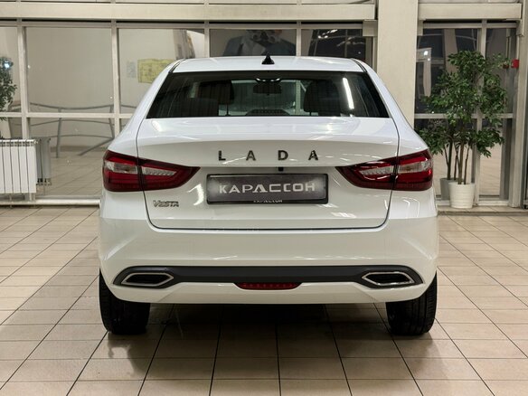 2024 Lada (ВАЗ) Vesta I Рестайлинг (NG), белый - вид 3