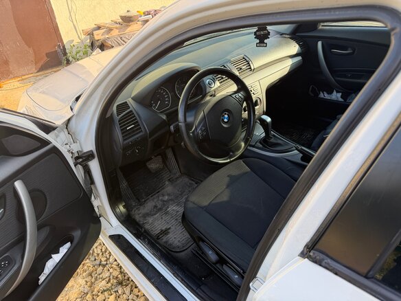 2009 BMW 1 серии 116i I (E81/E82/E87/E88) Рестайлинг, белый, 710000 рублей - вид 4