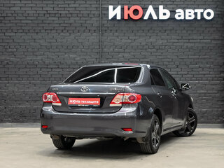 2011 Toyota Corolla X (E140, E150) Рестайлинг, чёрный, 970000 рублей, вид 4