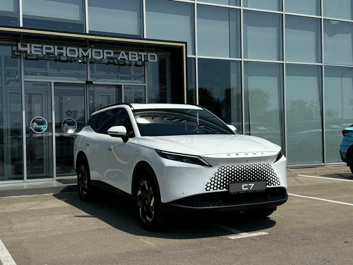 Открыть фотографии: Omoda C7