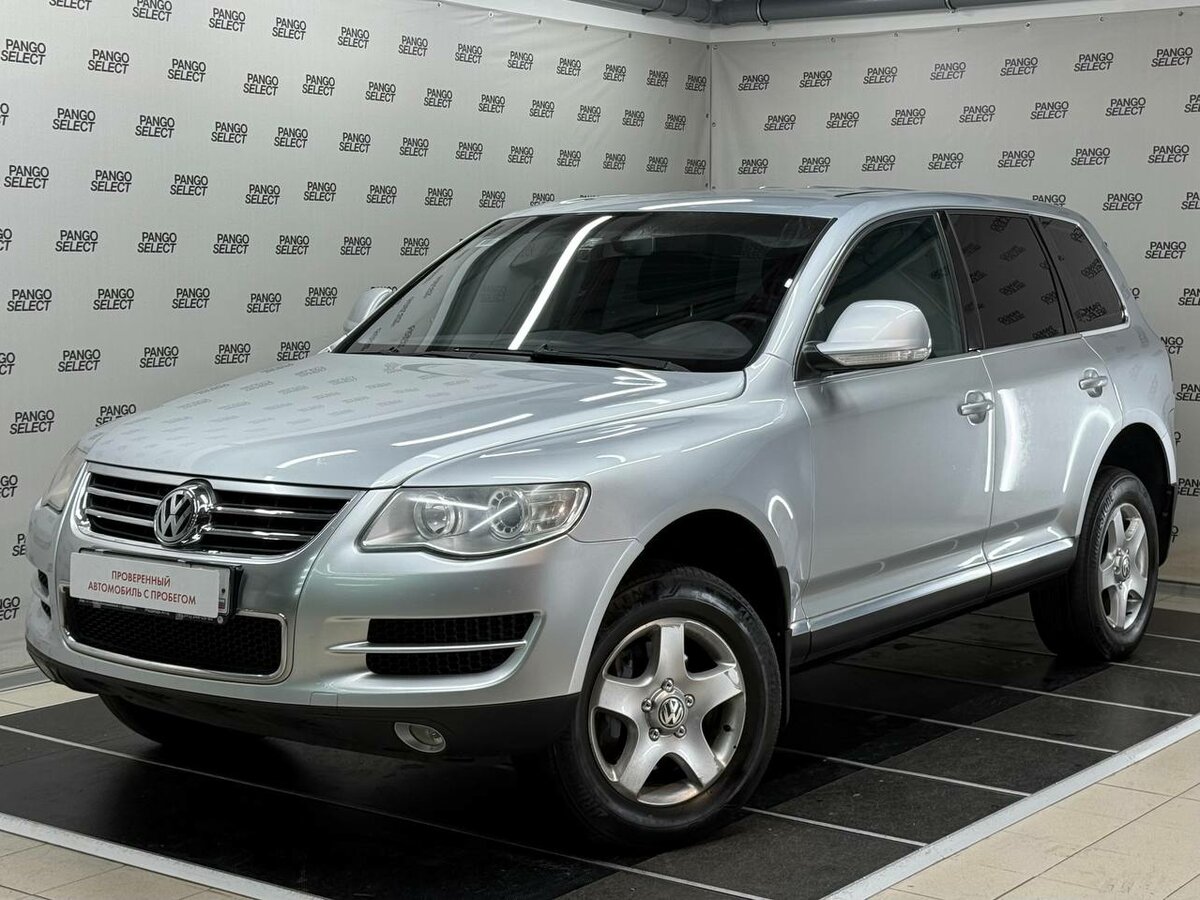 Открыть фотографии: Volkswagen Touareg I Рестайлинг