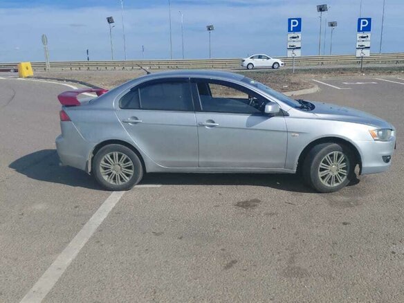 2007 Mitsubishi Lancer X, серебристый, 600000 рублей - вид 4