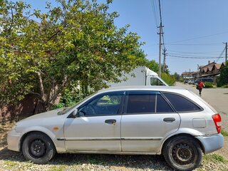 1999 Mazda 323 VI (BJ), серебристый, 110000 рублей, вид 4