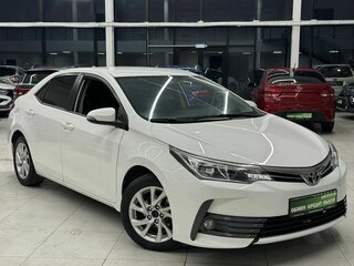 2018 Toyota Corolla XI (E160, E170, E180) Рестайлинг 1, белый, 1499000 рублей, вид 4