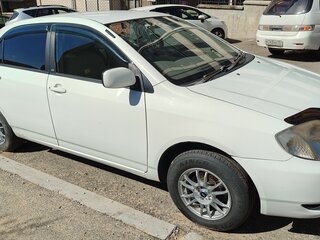 2001 Toyota Corolla IX (E120, E130), белый, 479000 рублей, вид 1