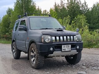 2011 Suzuki Jimny Kei car III Рестайлинг 1, чёрный, 715000 рублей, вид 4