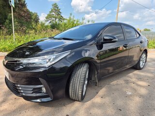2016 Toyota Corolla XI (E160, E170, E180) Рестайлинг 1, чёрный, 1300000 рублей, вид 2