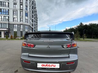 2012 Mitsubishi Lancer X Рестайлинг, серебристый, 930000 рублей, вид 2