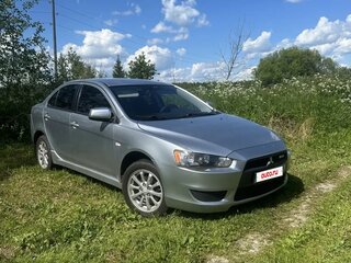 2009 Mitsubishi Lancer X, серебристый, 585000 рублей, вид 1