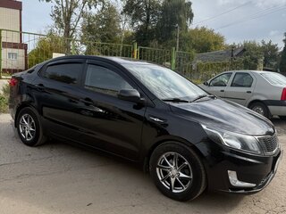 2012 Kia Rio 4-speed III, чёрный, 880000 рублей, вид 3