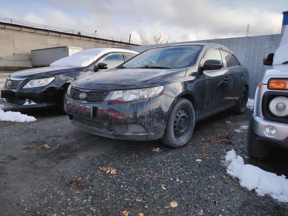 2011 Kia Cerato 5-speed II, чёрный, 556000 рублей