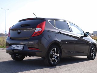 2015 Hyundai Solaris I Рестайлинг, коричневый, 865005 рублей, вид 5