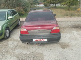 2005 Daewoo Nexia I, пурпурный, 190000 рублей, вид 3