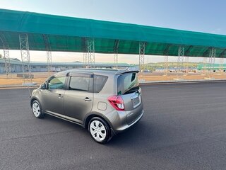 2009 Toyota Ractis I, коричневый, 858000 рублей, вид 4