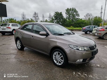 2011 Kia Cerato 6-speed II, серый, 1099000 рублей, вид 3
