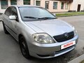 2003 Toyota Corolla IX (E120, E130), серебристый - вид 1