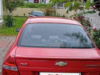 2010 Chevrolet Aveo I Рестайлинг, красный, 750000 рублей, вид 4
