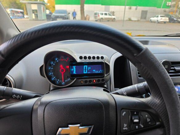 2012 Chevrolet Aveo II, серебристый - вид 6