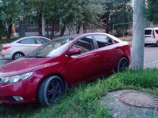 2012 Kia Cerato 6-speed II, красный, 550000 рублей, вид 2