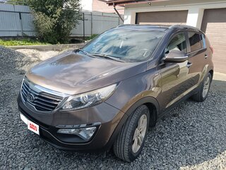 2012 Kia Sportage III, коричневый, 1370000 рублей, вид 1