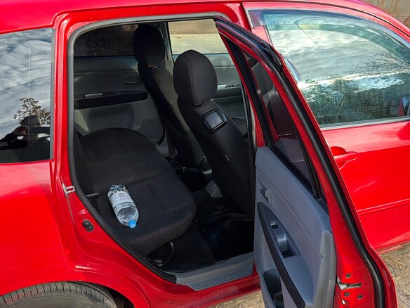 2003 Mazda 2 I (DY), красный, 240000 рублей - вид 18