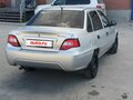 2012 Daewoo Nexia I Рестайлинг, серебристый, 295000 рублей - вид 1
