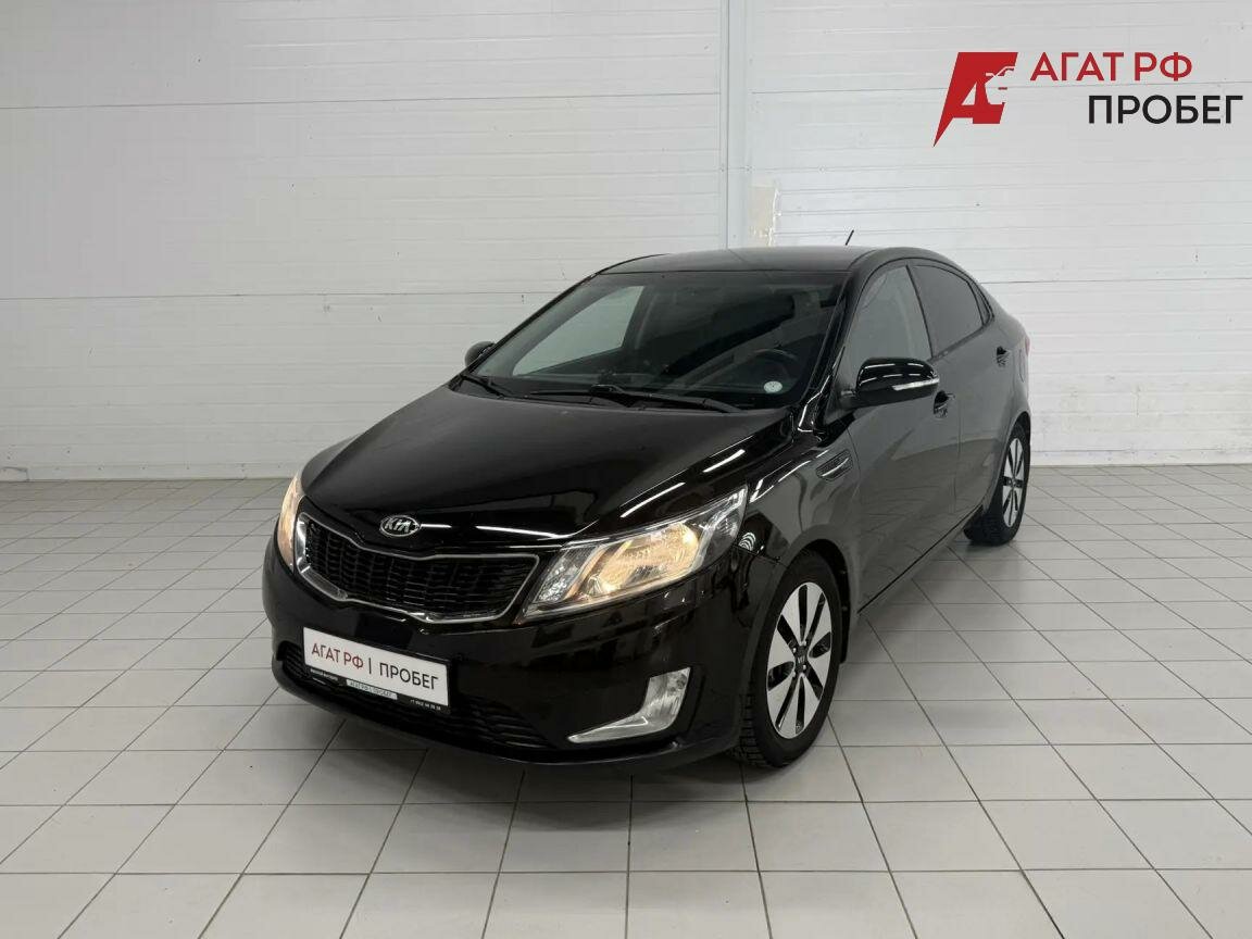 Открыть фотографии: Kia Rio III