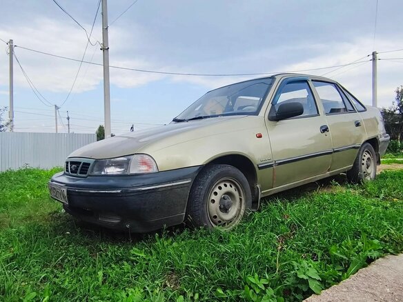 2006 Daewoo Nexia I, бежевый, 142500 рублей