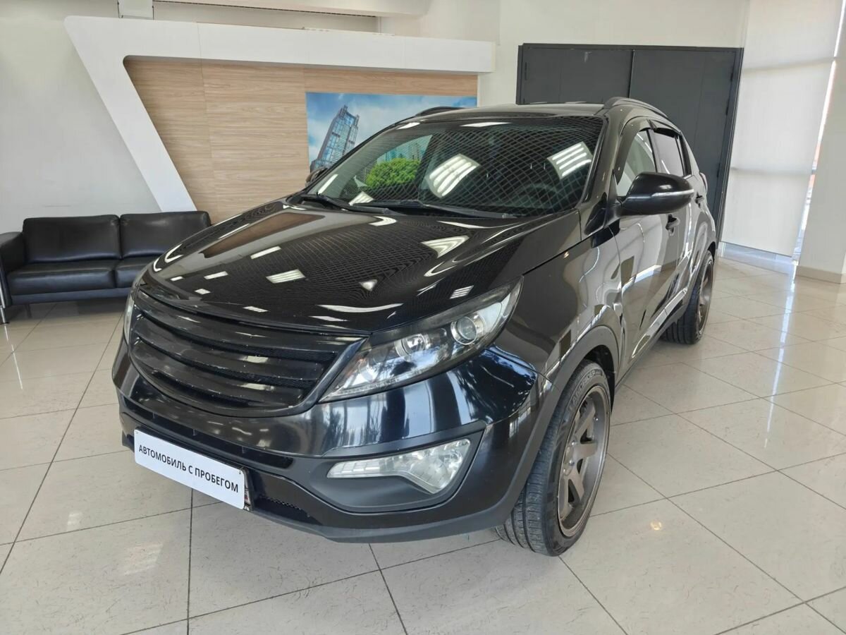 Открыть фотографии: Kia Sportage III