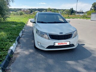 2012 Kia Rio 5-speed III, белый, 545000 рублей, вид 5