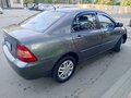 2005 Toyota Corolla IX (E120, E130) Рестайлинг, серый, 450000 рублей - вид 10
