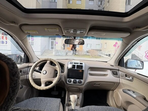 2005 Kia Sportage II, коричневый, 700000 рублей - вид 10