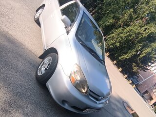 2003 Toyota Platz, серый, 425000 рублей, вид 1
