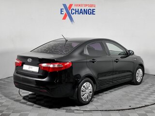 2012 Kia Rio 5-speed III, чёрный, 534000 рублей, вид 5