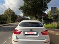 2010 BMW X6 35i 6-speed I (E71), белый - вид 2