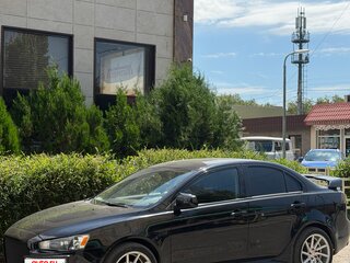 2010 Mitsubishi Lancer X, чёрный, 899000 рублей, вид 1