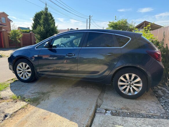 2010 Opel Astra J, синий - вид 4